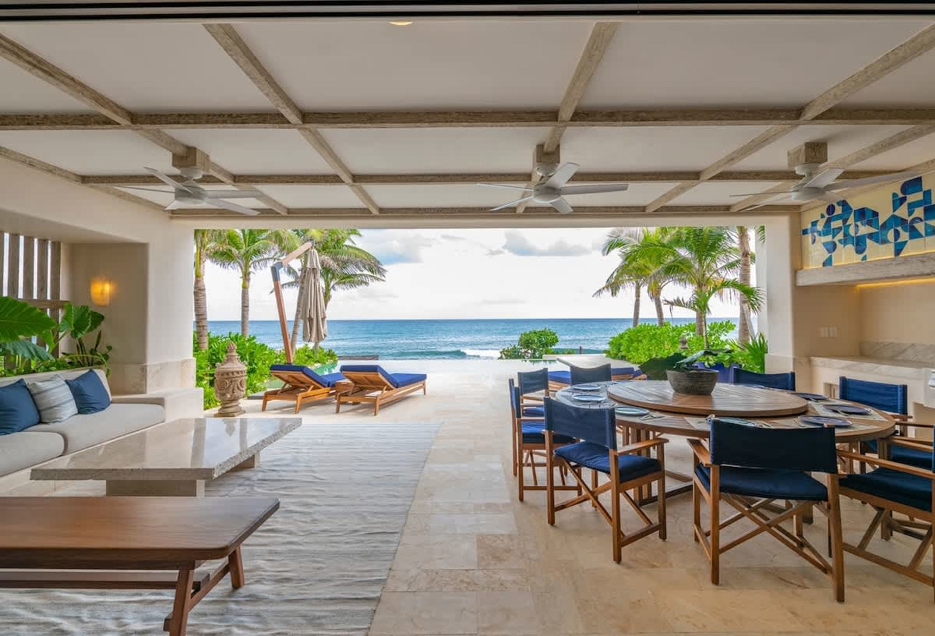 Outdoor dining area with ocean view.