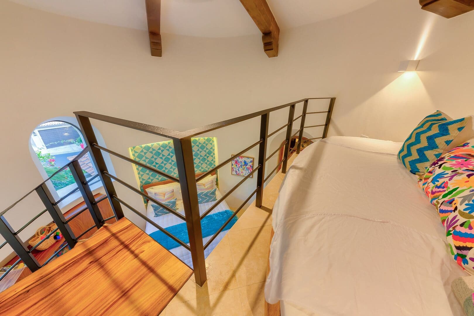 The railing of the loft bedroom in bedroom number 3.