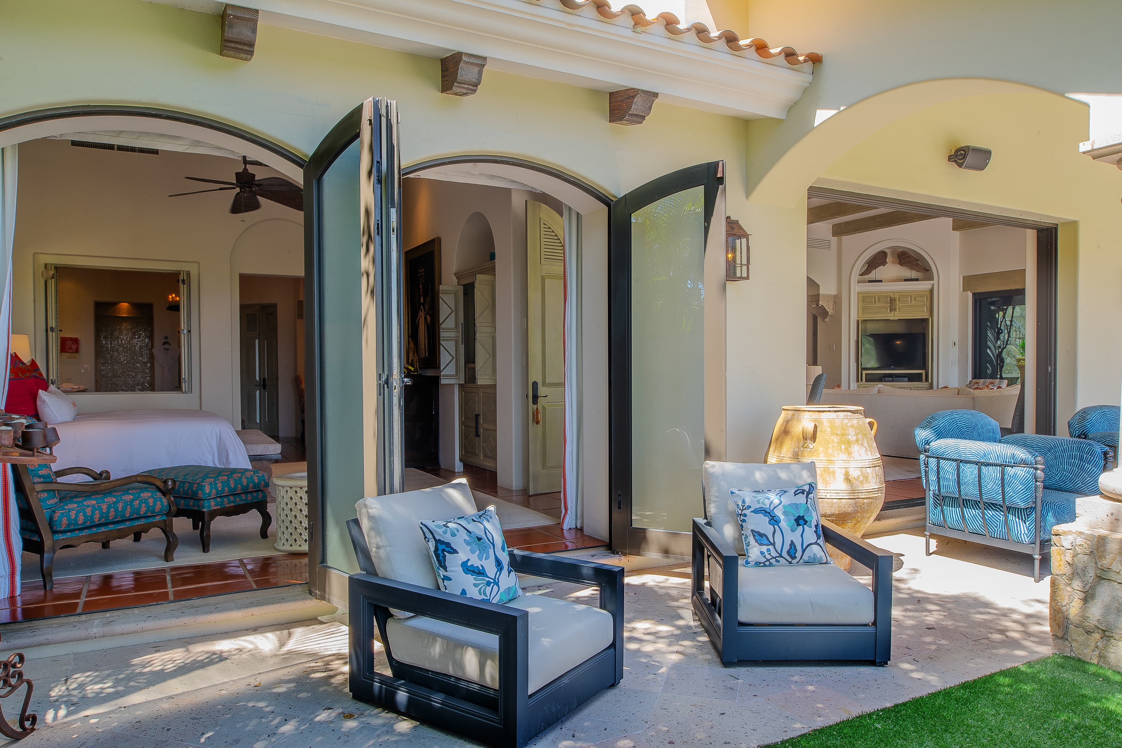 Step outside your suite to discover your own private outdoor lounge—perfectly styled for morning coffee and evening cocktails under charming terra cotta tiles and exposed beams.
